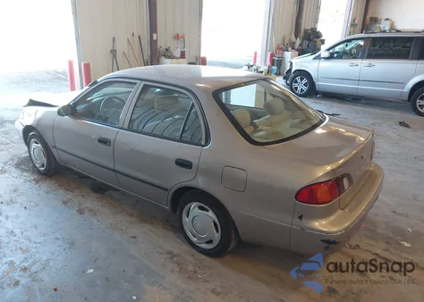 1999 Toyota Corolla Ce z USA, uszkodzony, nr VIN 2T1BR12EXXC198079